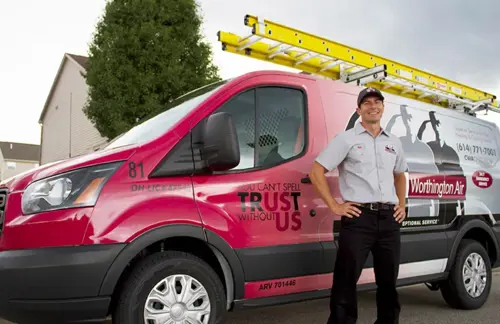 Columbus Worthington Air technician arriving for an HVAC maintenance check in a branded service van.